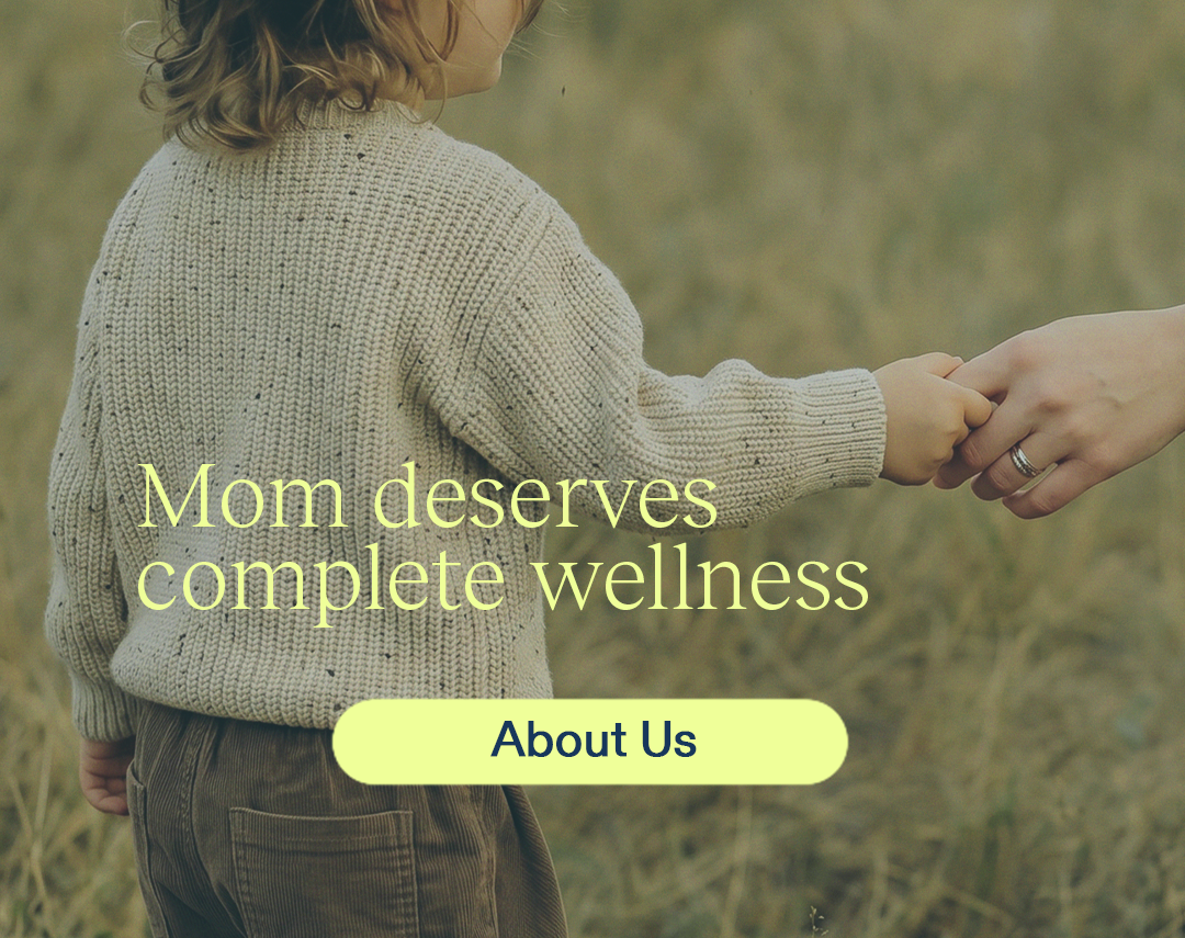 BANNER Your Health Partner ing movil - Numa Outdoor scene of a mom holding her child’s hand in a field; overlay text reads “Mom deserves complete wellness” with a pale yellow rounded “About Us” button.