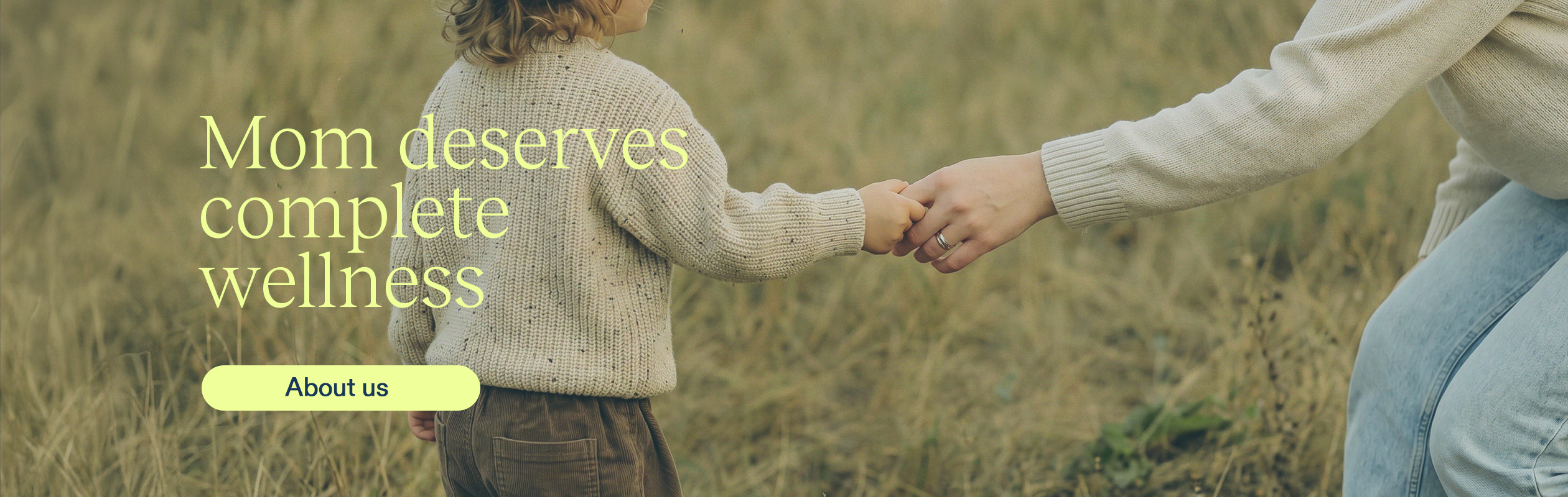BANNER Your Health Partner ing - Numa Mother and child hold hands in a sunlit field, with a wellness message overlaid: 'Mom deserves complete wellness'.