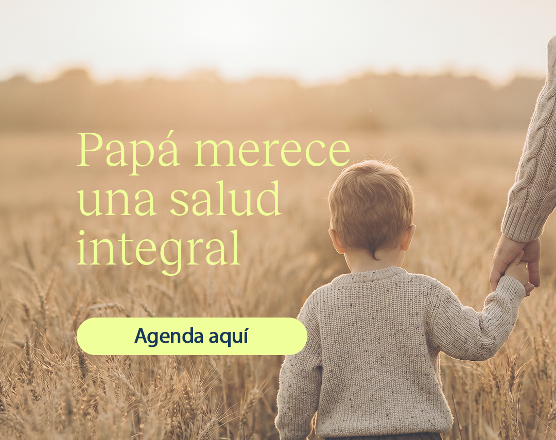 Father and child holding hands in a golden field at sunset, with the message 'Papá merece una salud integral' and a pale yellow 'Agenda aquí' button.